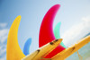 Colorful Surfboards Fins, Bright Sunny Sky In Background. PosterPrint - Item # VARDPI1976089