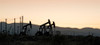 Silhouette of oil rigs at sunset, California, USA Poster Print - Item # VARPPI168408