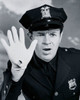 Portrait of a police officer making a stop gesture with his hand Poster Print - Item # VARSAL25522404