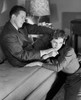 Young couple sitting in a living room Poster Print - Item # VARSAL2551037A