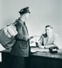 Postman bringing mail to a man sitting behind desk Poster Print - Item # VARSAL2555083