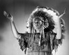 Native American man wearing traditional clothing and gesturing Poster Print - Item # VARSAL25517885A