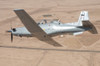 A T-6 Texan flying over Camp Speicher, Tikrit, Iraq Poster Print - Item # VARPSTSTK104734M