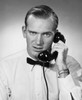 Portrait of businessman using telephone Poster Print - Item # VARSAL25548249