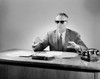 Portrait of gesturing senior businessman wearing sunglasses in the office Poster Print - Item # VARSAL255419971
