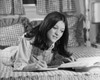 Teenage girl lying in the bed and writing in a spiral notebook Poster Print - Item # VARSAL2553887