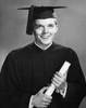 Male graduate holding a diploma and smiling Poster Print - Item # VARSAL2553189B