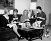 Four women drinking tea and talking Poster Print - Item # VARSAL25549070