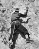 Rear view of a man climbing on a mountain  Jackson Hole  Wyoming  USA Poster Print - Item # VARSAL2554018