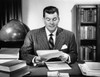 Businessman sitting in an office and reading documents Poster Print - Item # VARSAL2553065B