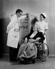 Doctor chatting with senior patient in wheel chair Poster Print - Item # VARSAL255424903