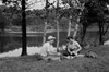 USA  Vermont  Wilder Lake  mid adult couple having picnic on lake shore Poster Print - Item # VARSAL255424306