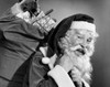 Close-up of Santa Claus carrying a sack of gifts on his back Poster Print - Item # VARSAL25523855B