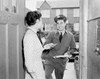Woman receiving letter from postman Poster Print - Item # VARSAL255422427