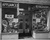 Appliances in a window display of an electronics store Poster Print - Item # VARSAL2551271