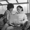 Young woman and her mother watching gift Poster Print - Item # VARSAL255420987