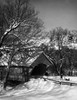 Person pulling a sled near a covered bridge  Lyndon  Vermont  USA Poster Print - Item # VARSAL25540112A