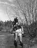 Young woman holding a fishing rod Poster Print - Item # VARSAL25521215