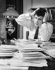 Businessman sitting in an office and looking worried Poster Print - Item # VARSAL25534384