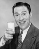 Close-up of a mature man holding a glass of milk Poster Print - Item # VARSAL25512686A
