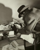 Rear view of a thief stealing documents Poster Print - Item # VARSAL2553797