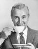 Portrait of a mature man drinking from a tea cup Poster Print - Item # VARSAL25548573