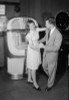 Young couple dancing by jukebox in bar Poster Print - Item # VARSAL255422967
