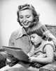 Mother and daughter reading book Poster Print - Item # VARSAL2553153B