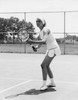 Young woman playing tennis on a tennis court Poster Print - Item # VARSAL25524211