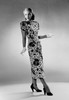 Young woman wearing dress  high heels and formal gloves Poster Print - Item # VARSAL255422338