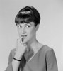 Young woman biting nails Poster Print - Item # VARSAL255417642