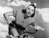 Low angle view of young woman cycling Poster Print - Item # VARSAL2556050