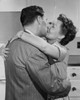 Mid adult couple kissing Poster Print - Item # VARSAL25550165