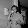 Mature woman talking through phone and smiling Poster Print - Item # VARSAL255421655
