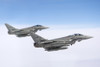 A pair of Italian Air Force F-2000A Typhoon aircraft flying over the Tyrrhenian Sea during an air-to-air refueling operation. Poster Print - Item # VARPSTDFC100125M