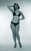 Studio portrait of smiling woman wearing bikini Poster Print - Item # VARSAL255417204