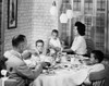 Family with three children eating together Poster Print - Item # VARSAL25542739
