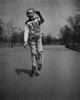 Boy roller skating in park Poster Print - Item # VARSAL255422385