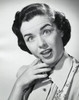 Studio portrait of young woman looking surprised Poster Print - Item # VARSAL25510480