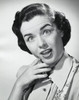 Studio portrait of young woman looking surprised Poster Print - Item # VARSAL25510480