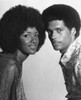 Portrait of a young couple grinning Poster Print - Item # VARSAL25516126