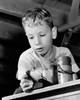 Close-up of a boy playing with a model airplane Poster Print - Item # VARSAL2552310