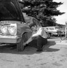 Man repairing car Poster Print - Item # VARSAL255416394