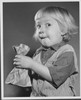 Close-up of a girl holding a paper bag Poster Print - Item # VARSAL25514337