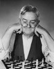 Close-up of a senior man playing chess Poster Print - Item # VARSAL25549000