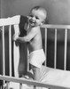 Side profile of a baby standing in a crib Poster Print - Item # VARSAL2559618