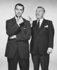 Two businessmen standing together Poster Print