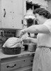 Woman preparing turkey Poster Print - Item # VARSAL255418694
