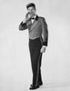 Bellhop talking with his hand near his mouth Poster Print - Item # VARSAL2551307