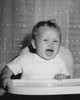 Close-up of a baby sitting in a high chair and crying Poster Print - Item # VARSAL2559719